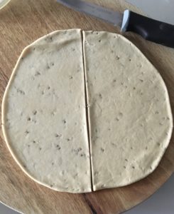 dough circle cut with pairing knife